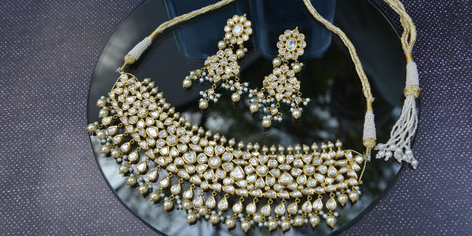 Kundan bridal necklace and earring set with white gemstones